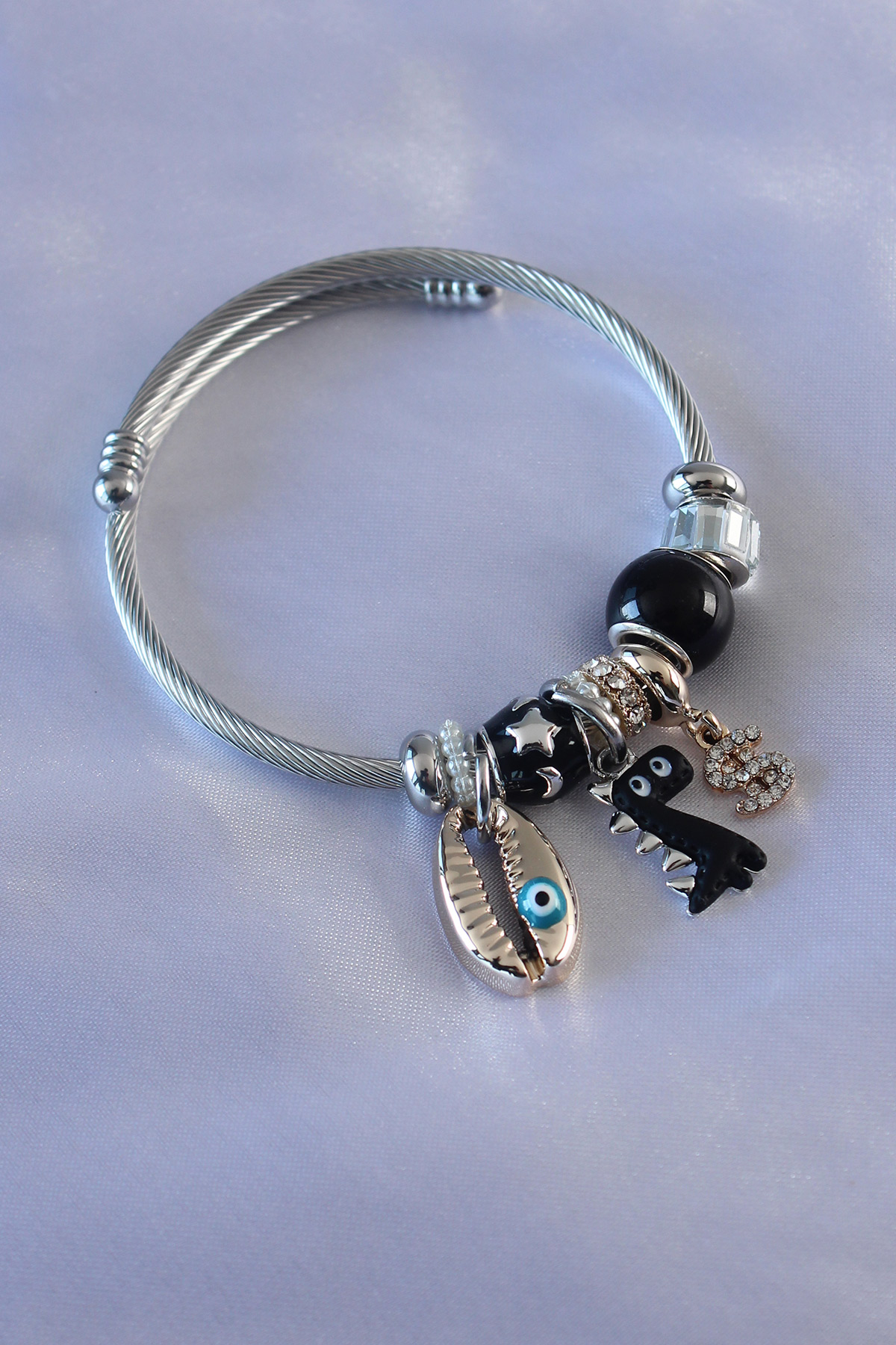 Erb%20Siyah%20Renk%20Dinazor%20Figür%20Deniz%20Kabuğu%20Detay%20Zirkon%20Taşlı%20Charm%20Model%20Kadın%20Bileklik